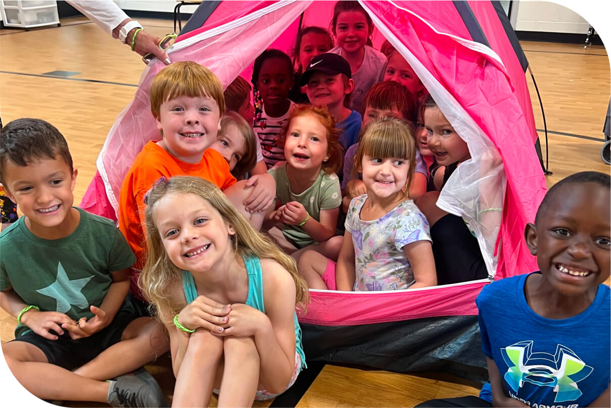 kids playing in tent