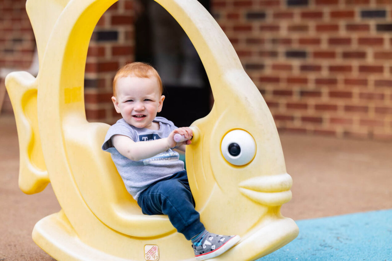 LeafSpring School toddler playing outside
