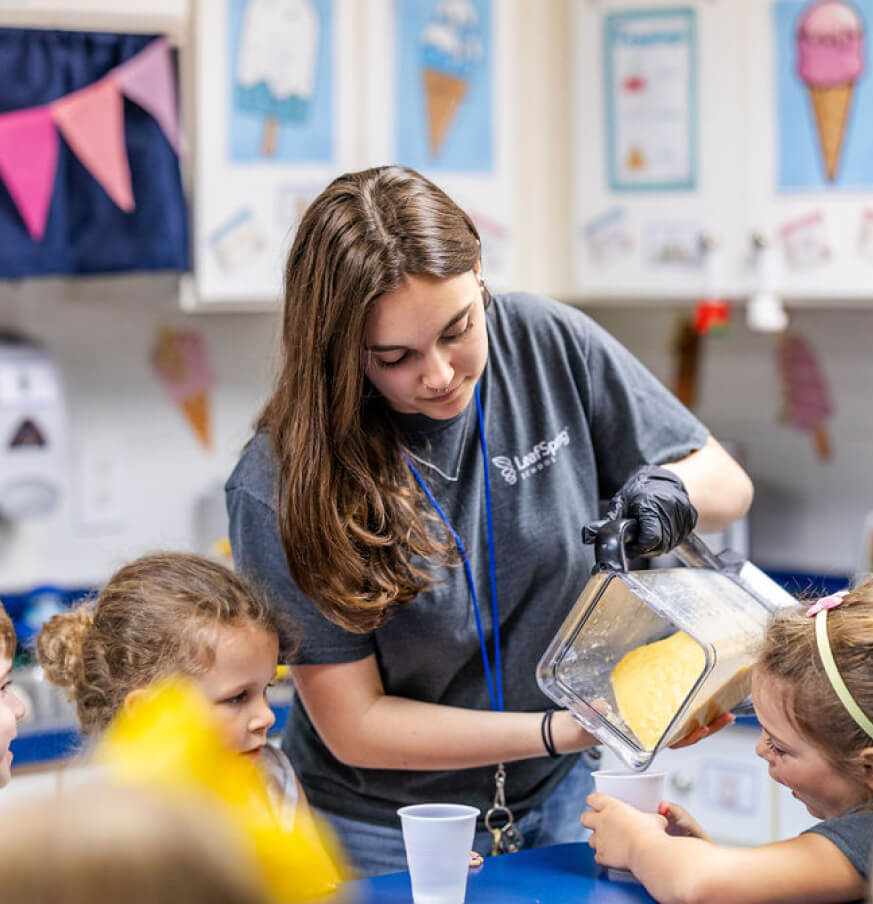 LeafSpring School teacher doing experiments with students